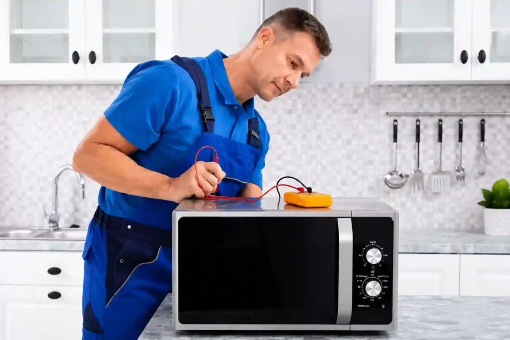 Technician testing microwave performance after inspection.